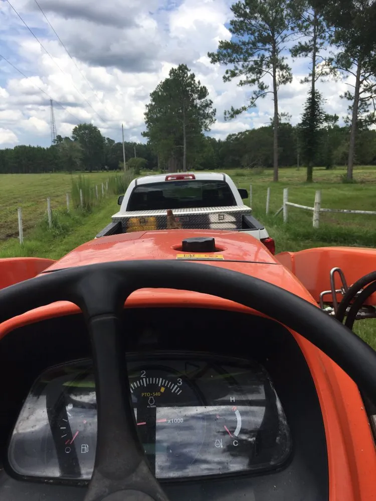 Expert landscape installation for homes in St. Augustine, FL by Kevin Greer Bush Hog Box Blade and Tractor Work