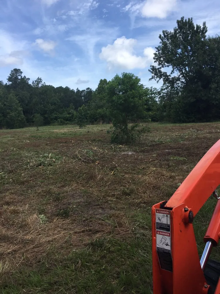 Top-rated landscape installation for beautiful yards in St. Augustine, FL by Kevin Greer Bush Hog Box Blade and Tractor Work