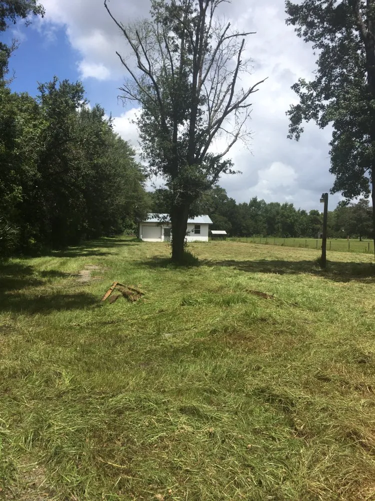 Local lawn mowing service in St. Augustine, FL by Kevin Greer Bush Hog Box Blade and Tractor Work