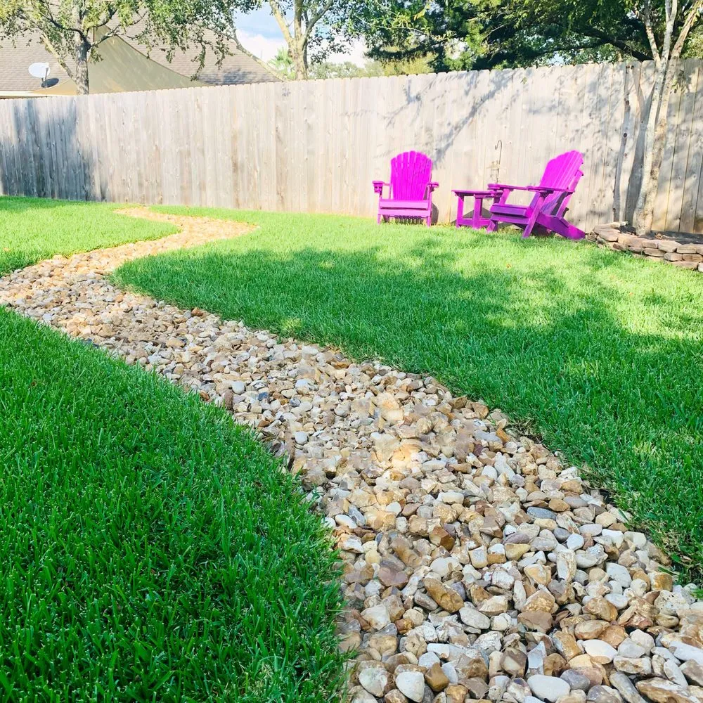 Custom landscape installation for homes in College Station, TX by Kevin's Landscapes