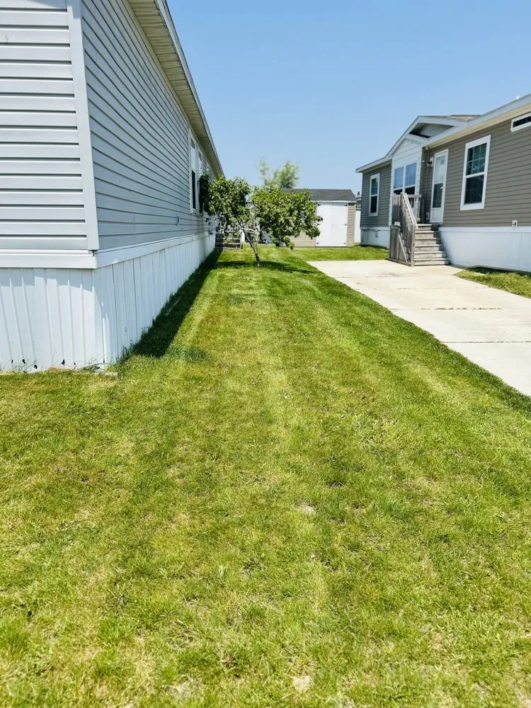 Expert yard maintenance for residential properties across Ypsilanti, MI - Key To The Top Enterprise