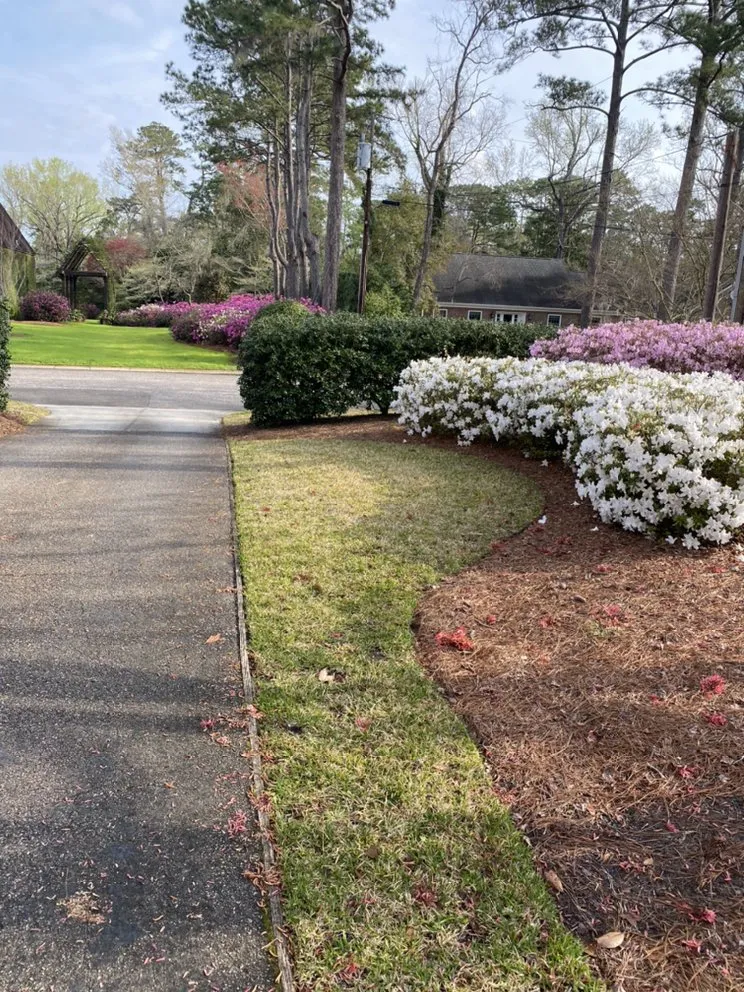 Affordable lawn mowing service for outdoor upgrades in Wilmington, NC by Kidd Contracting