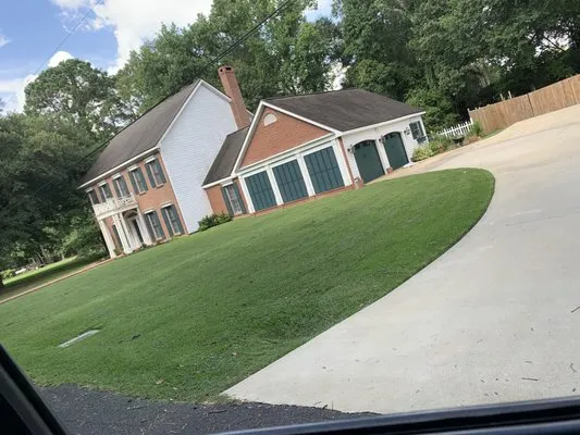 Kidders Lawncare And Yard Service Logo