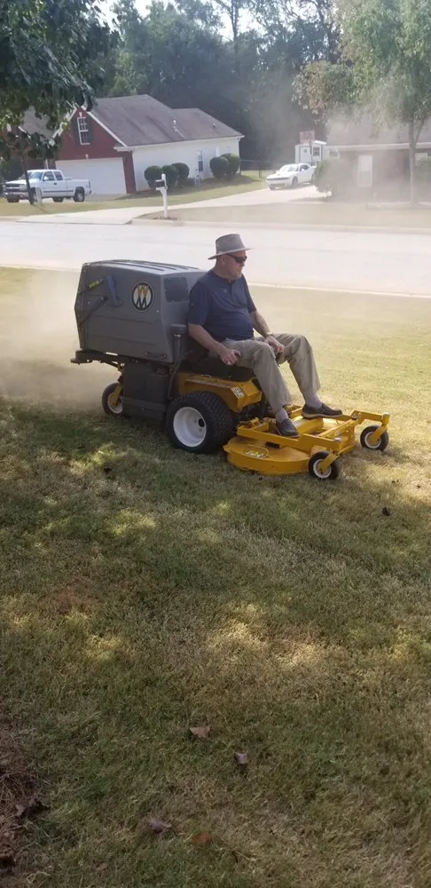 Top-rated lawn care service for residential properties in Covington, GA by Kiker's Lawn Care