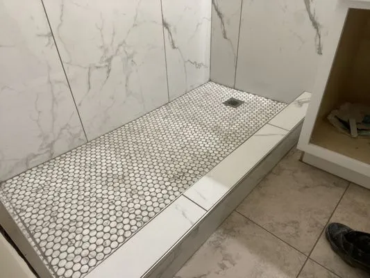 Kikos Landscaping & Tile Logo