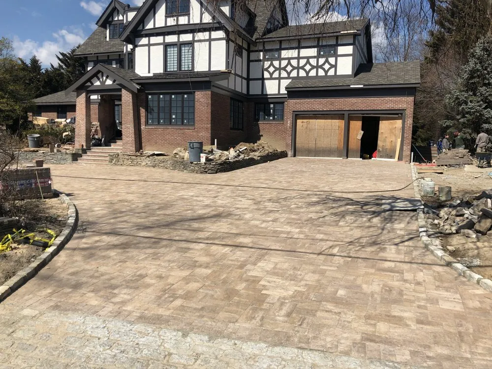 Affordable lawn mowing service for year-round maintenance across East Rockaway, NY - King Landscape Service