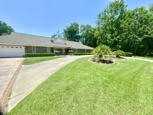 Kingdom Coastal Landscaping Logo