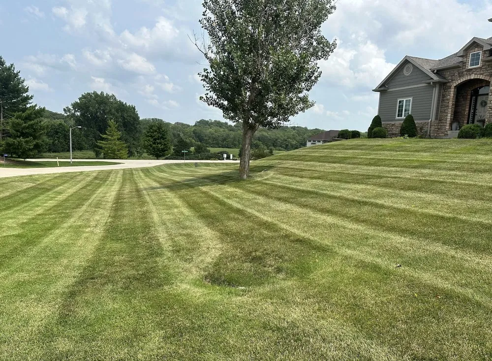 Custom landscape design with custom design across Ames, IA - Kingdom Keepers