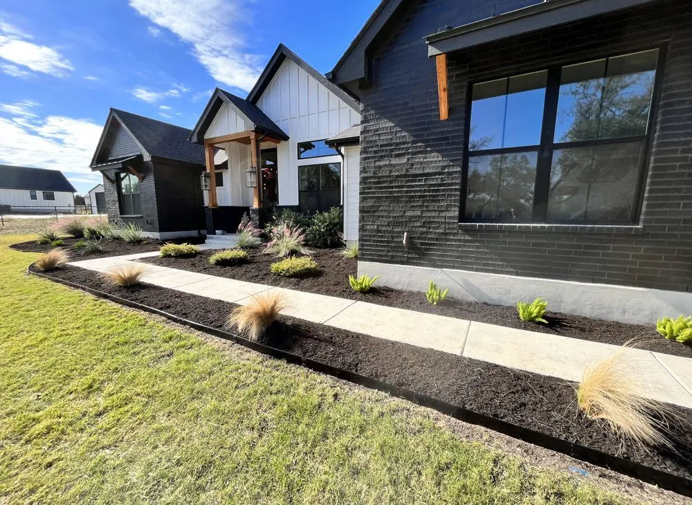 Professional lawn mowing service for residential properties in Horseshoe Bay, TX by Kings Landscaping