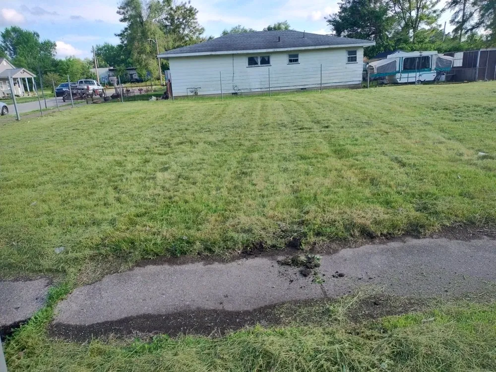 Custom landscape installation for year-round maintenance in Terre Haute, IN by Kings Lawn Care