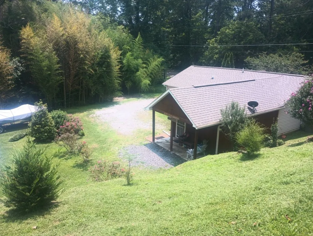 Expert outdoor landscaping for homes in Attalla, AL by Kings lawn service and pressure washing