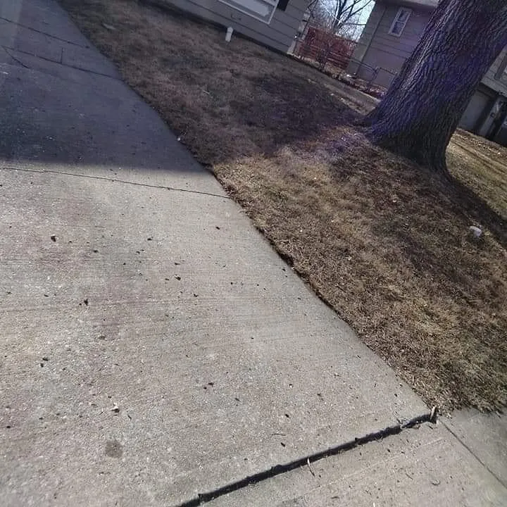 Professional lawn mowing service for outdoor upgrades in Kansas City, MO by Kings property maintenance