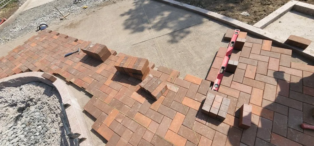 Expert lawn care service for residential properties in Rochester, NY by Kingsguard Contractors