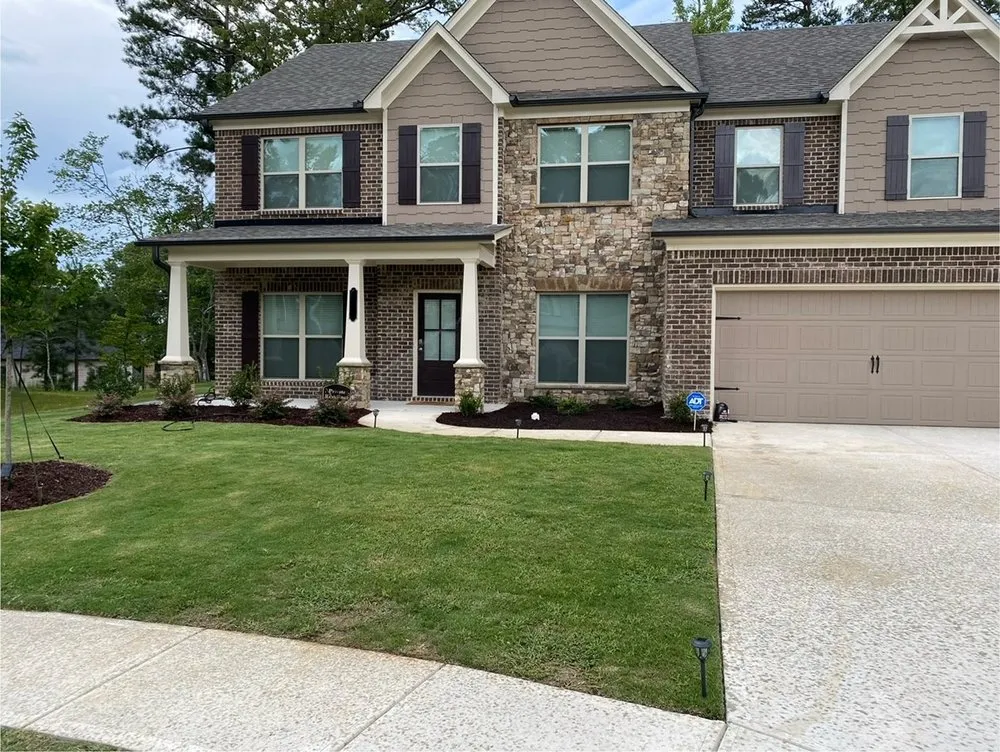 Custom outdoor landscaping in Stone Mountain, GA by Kingswood Property Services