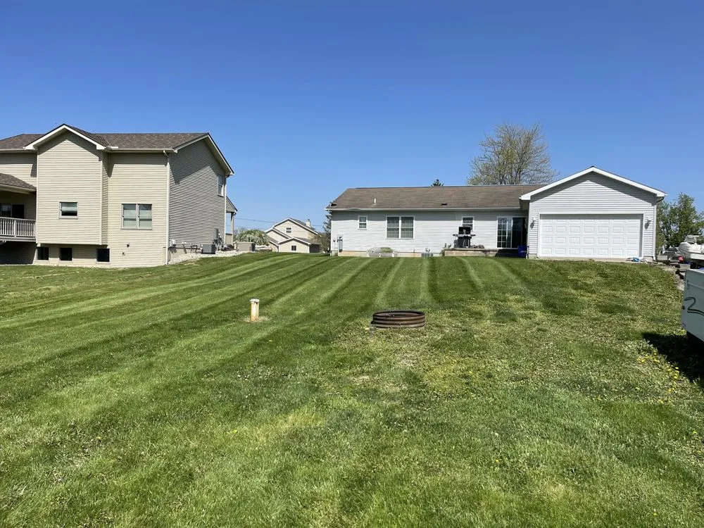 Custom garden landscaping for residential properties in Onsted, MI by Kish Lawn and Landscape