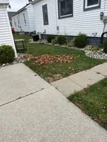 Expert lawn care service with custom design in Lincoln Park, MI by Kiss My Grass Lawn and Snow