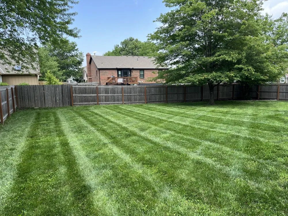 Professional lawn mowing service in Lee's Summit, MO by Kiss My Grass Lawn Care