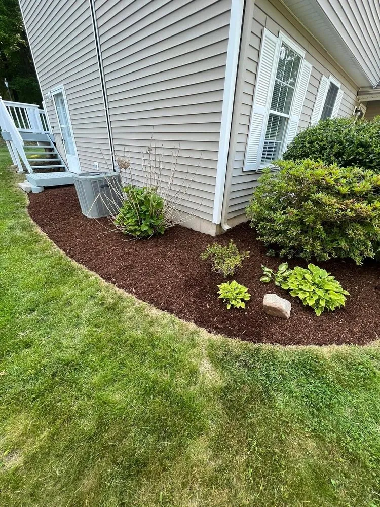 Custom lawn care service in Bristol, CT by Kiss My Grass Property Maintenance