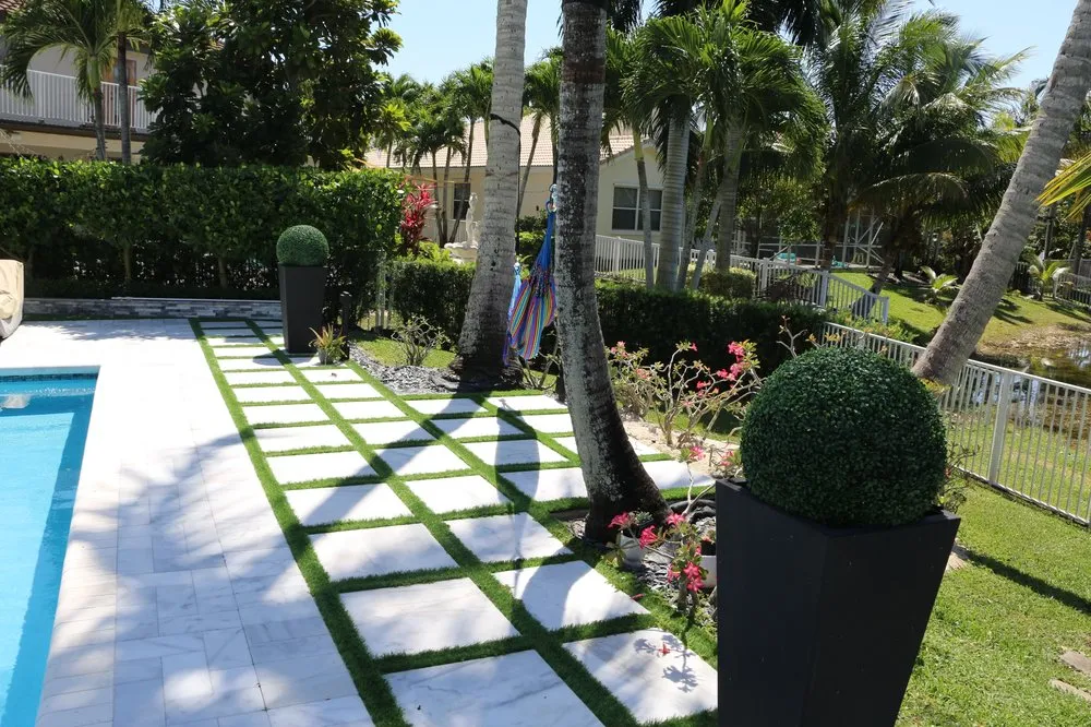 Affordable yard cleanup service with custom design across Miami Beach, FL - Kitchen Door Landscaping