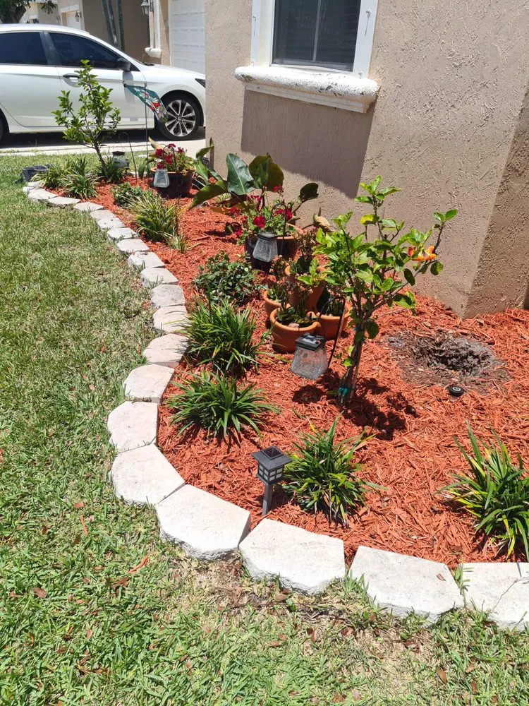 Expert lawn mowing service in Riviera Beach, FL - Kiwis Lawn and Landscaping Services