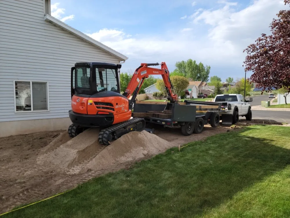 Trusted lawn mowing service for year-round maintenance in Layton, UT by KJ Excavation & Landscaping
