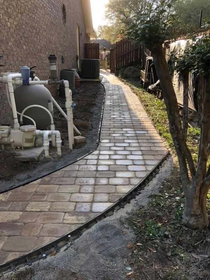 Affordable lawn mowing service for year-round maintenance in Cantonment, FL by K&J Landscaping