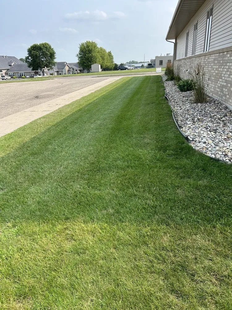 Expert lawn care service for residential properties in Watertown, SD by K&J Lawncare