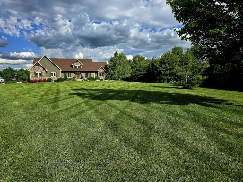 Custom yard cleanup service for year-round maintenance in Topeka, KS by Kleen Cut Services