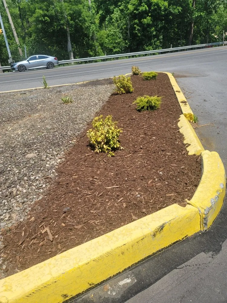 Custom outdoor landscaping with custom design across Mount Union, PA - Klines Property Maintenance