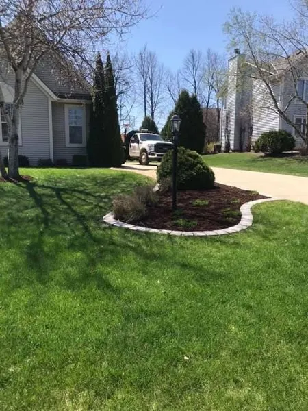 Affordable lawn mowing service for year-round maintenance in Richfield, WI by Kling's Lawn & Landscape
