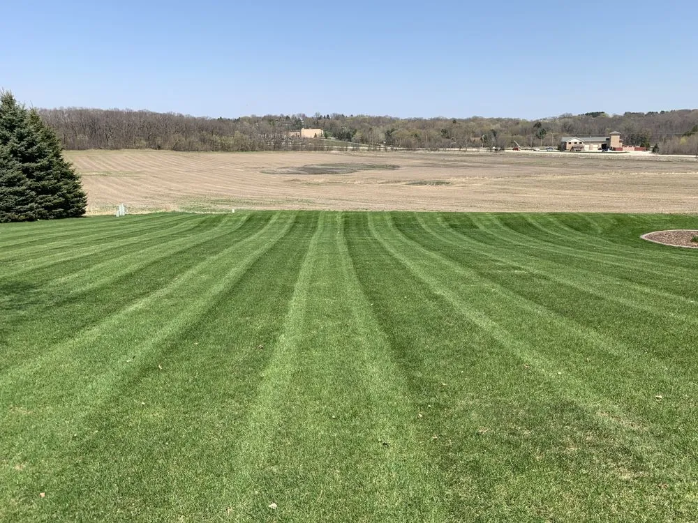 Professional lawn care service for residential properties across Pewaukee, WI - Klopp Landscaping