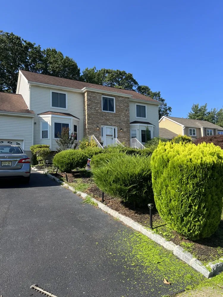 Expert lawn mowing service for residential properties across Freehold, NJ - K&M Landscaping