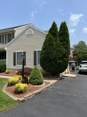 K&M Landscaping Logo