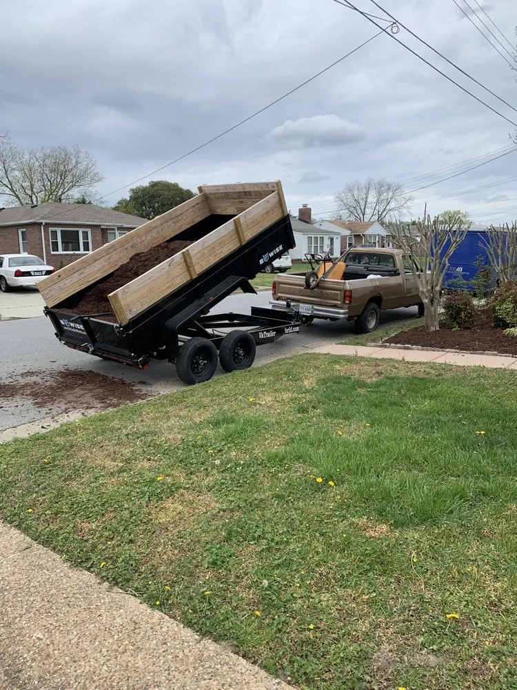 Affordable outdoor landscaping for residential properties in Yorktown, VA by KM Lawn & Landscape