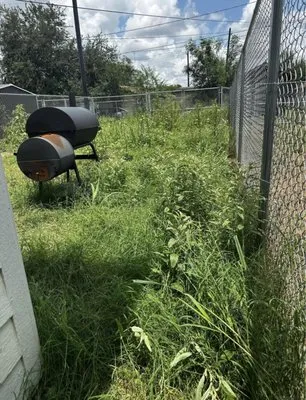 K&M Lawn Services Logo