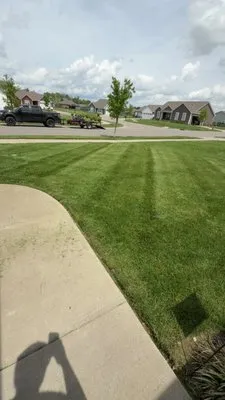 KM Lawncare Logo