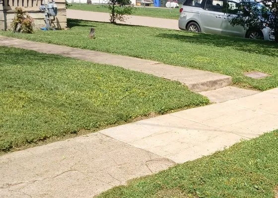 Kmack's Lawn Care Logo