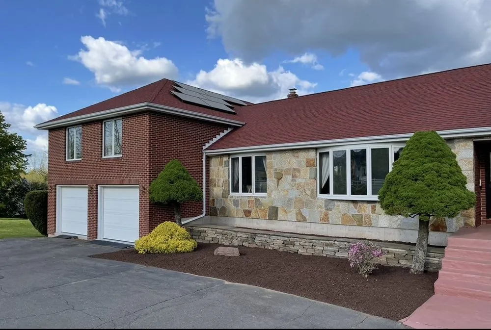 Local yard cleanup service with custom design in East Granby, CT by KMC Painting and Property Maintenance