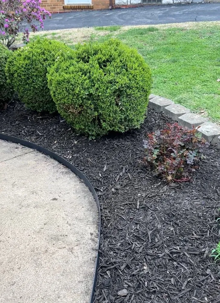 Professional landscape installation with custom design across Overland, MO - KMPI Lawn Service and Landscaping