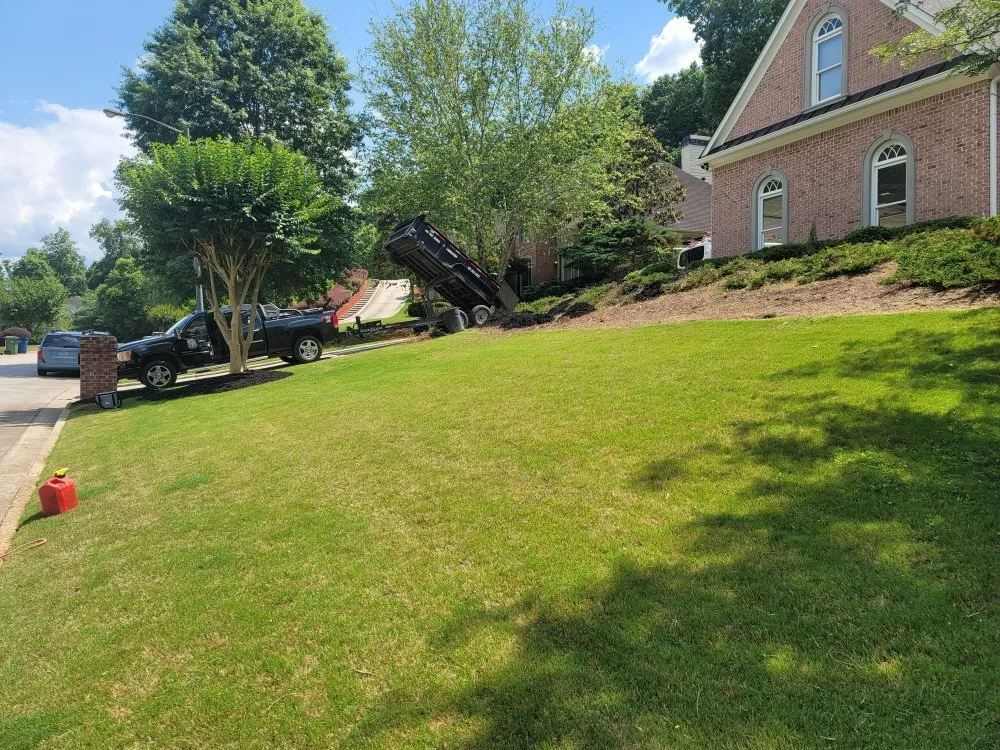 Custom landscaping services for year-round maintenance in Woodstock, GA by KND Tree Service & Landscaping