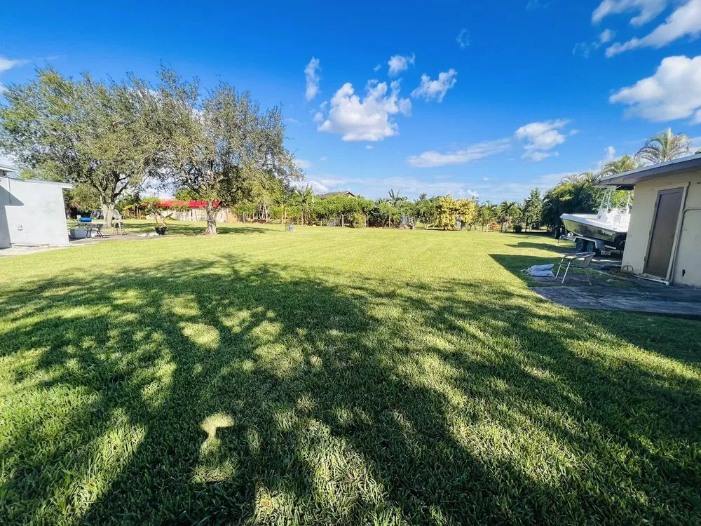 Custom landscape design for homes in Homestead, FL by Knockout Lawn & Landscape