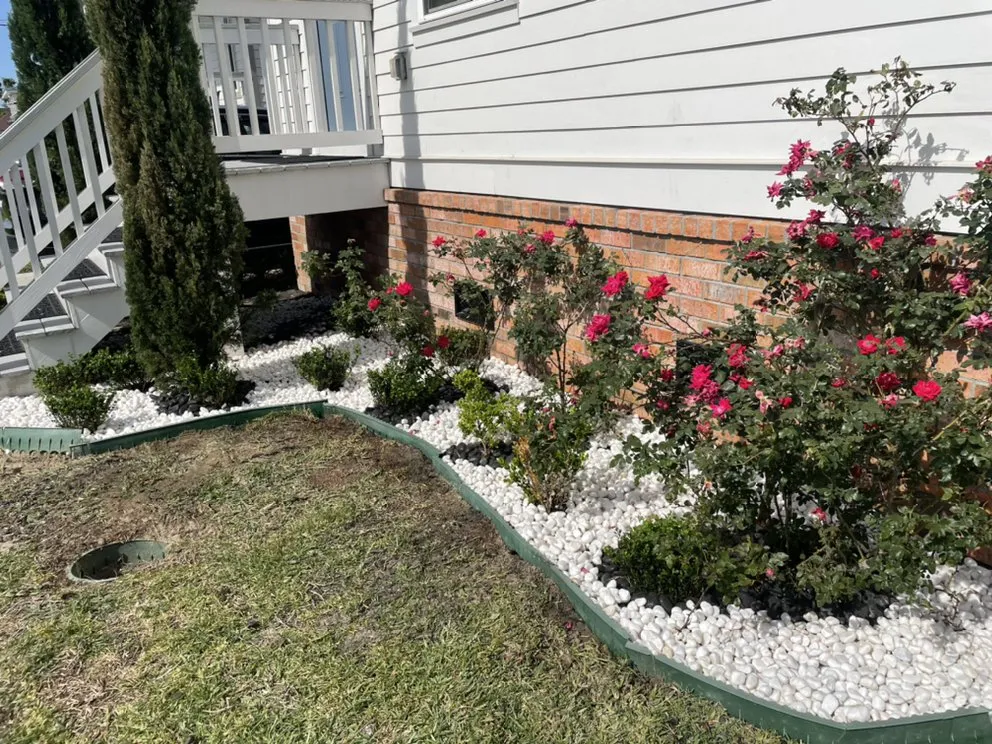 Custom landscape installation for year-round maintenance in Chalmette, LA by KoMar Lawn Care Services