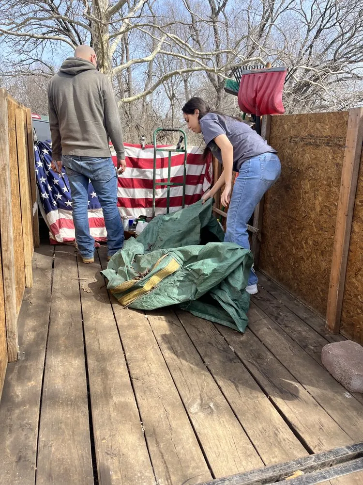 Custom lawn mowing service for year-round maintenance in Topeka, KS by Kong’s Junk Removal