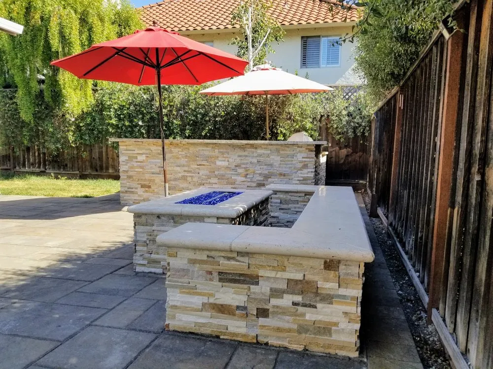 Expert lawn mowing service for residential properties in Santa Clara, CA by Konig Construction & Outdoor Living Specialists