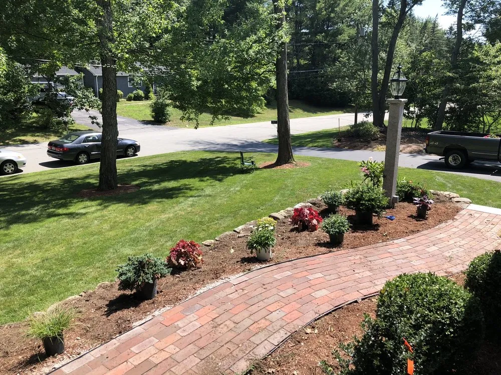 Professional lawn care service for outdoor upgrades in Andover, MA by Konjoian's Greenhouses & Landscape Solutions