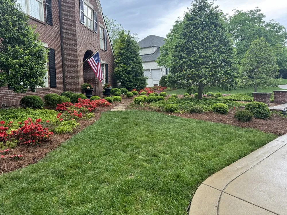 Expert lawn mowing service for year-round maintenance in Louisville, KY by Korfhage Landscape & Designs