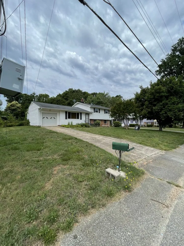 Custom outdoor landscaping with custom design in Greer, SC by Kountry Lawn Care