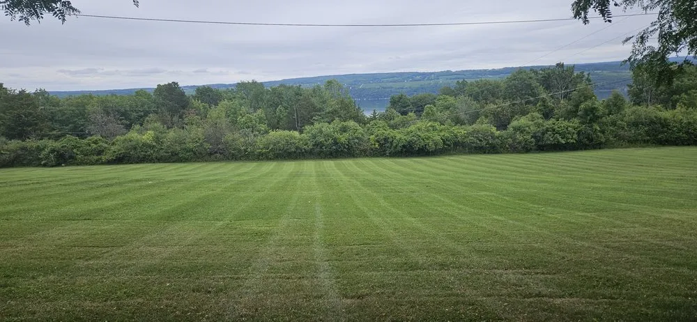 Professional lawn mowing service for year-round maintenance in Dundee, NY by Krause Lawn Care