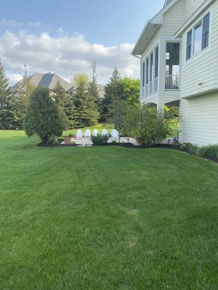 Expert lawn mowing service for beautiful yards in Anoka, MN by Kretsu Lawn & Landscaping