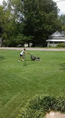Krista's Kutz Landscaping & Pressure Washing Logo